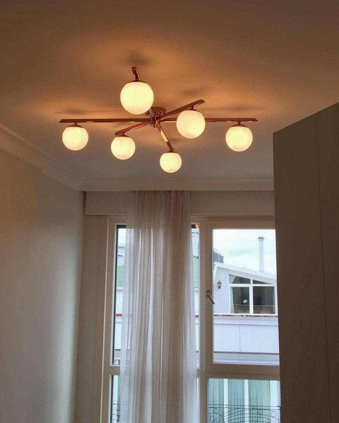 Arel Lighting Brushed Brass / 6*Elypse Asymetrical GEBET 6 Arm Large Semi Flush Mount Lighting