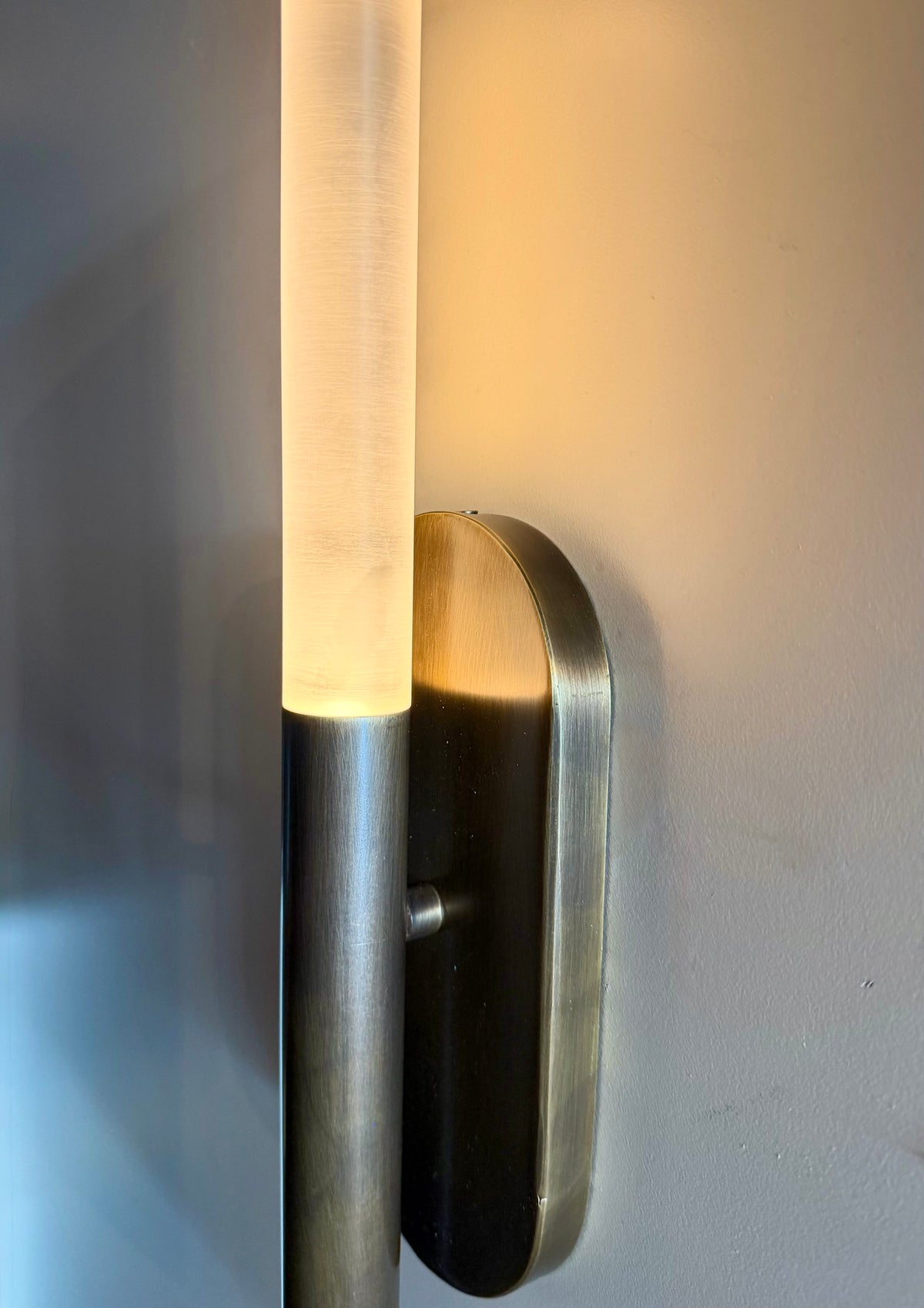 Close-up of the MUSALA plexiglass diffuser, metal tube and oval backplate