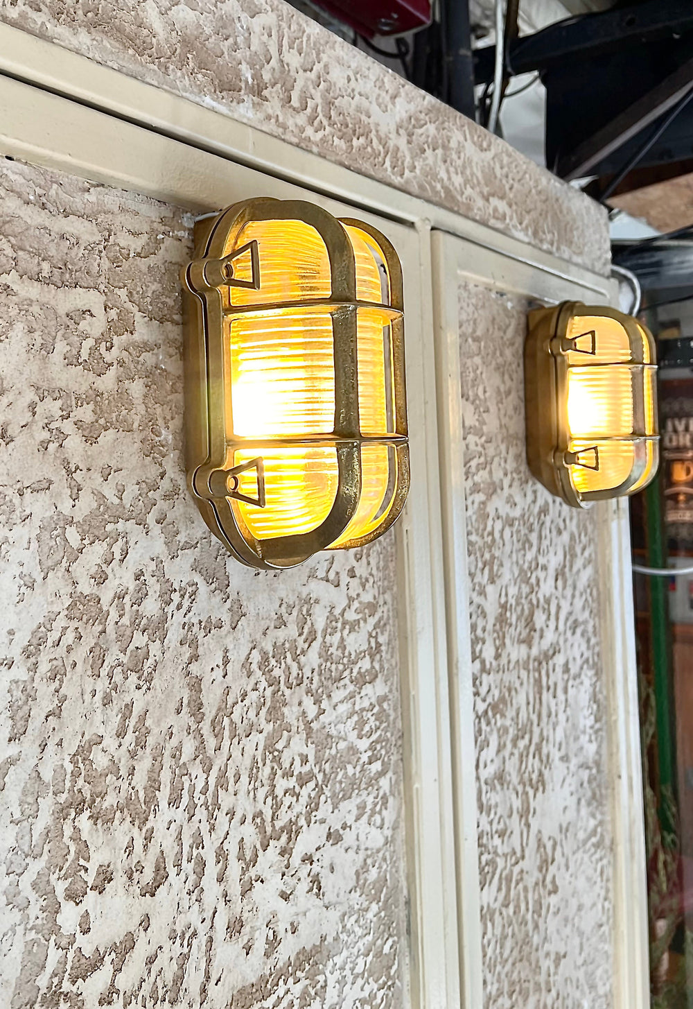 PINSK SMALL Nautical Wall Sconce Side by Side on the entrance of a restaurant