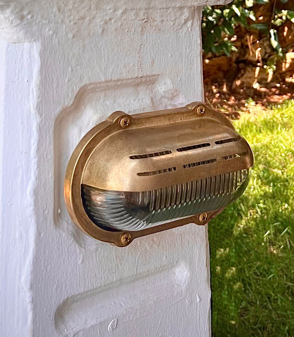 Yaqter Nautical Outdoor Wall Sconce, finish: raw brass