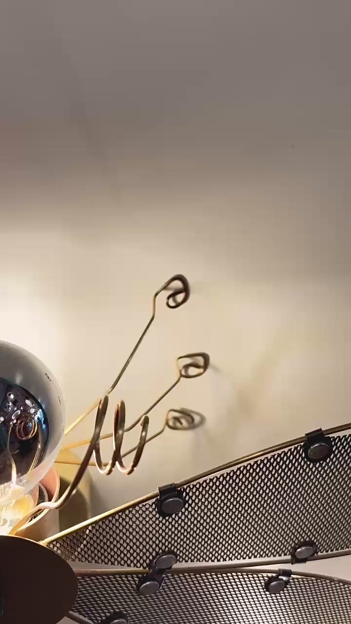 Video of the SUCEEVA steampunk dragonfly wall sconce showing its brass details and adjustable gooseneck tail