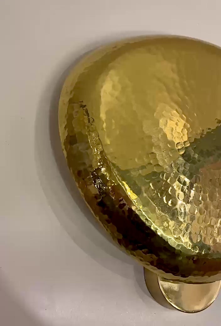 Video of the SOBRA hammered brass wall sconce